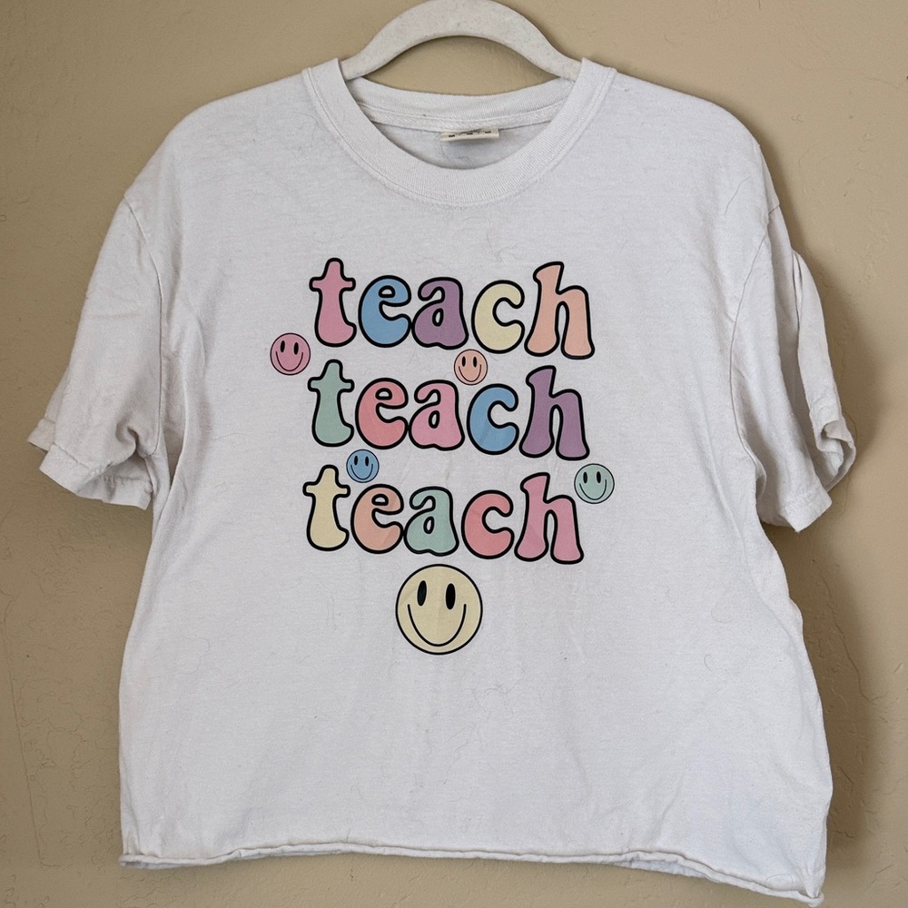 Teacher White Tee with Colorful and Groovy Teach and Smiley Face Design CROPPED